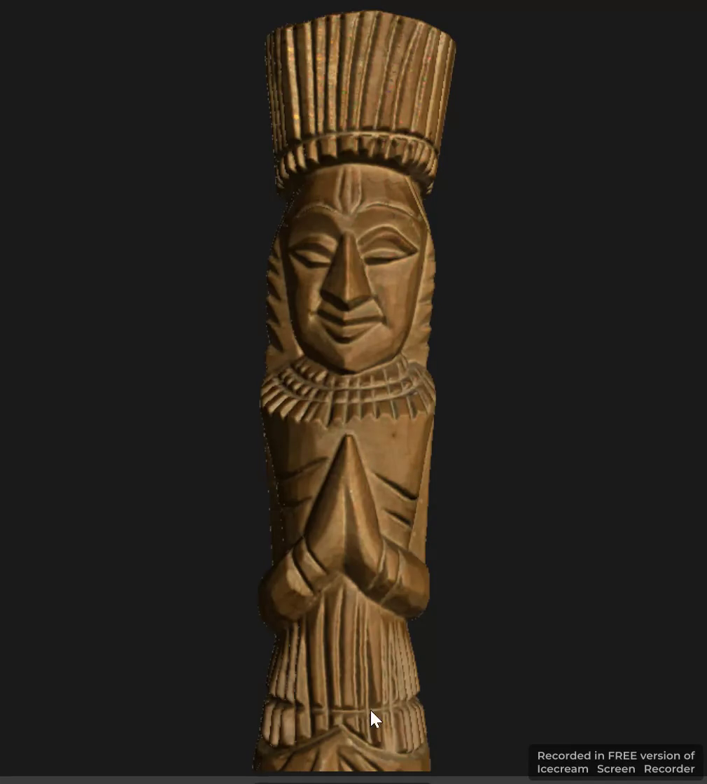 Front view of a carved figurine digital model extracted from the supplied museum artifact video