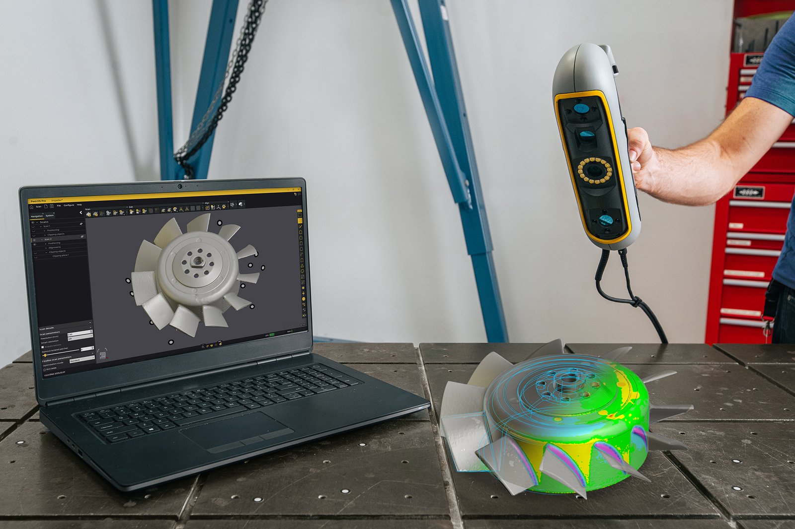 Peel 3 scanning an impeller beside a laptop displaying its digital model