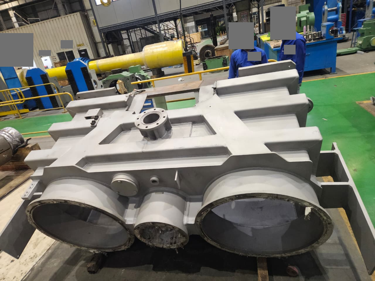 Industrial tank used for reverse engineering. Identifying background details are masked.